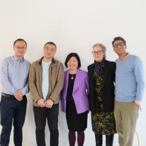 Author Ken Liu stands with Lehigh faculty for a photo