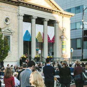 A crowd gathers in front of the Allentown Art Museum to celebrate its opening