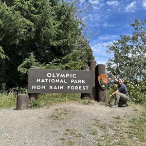 Kyla Richards poses with the Olympic National Park sign