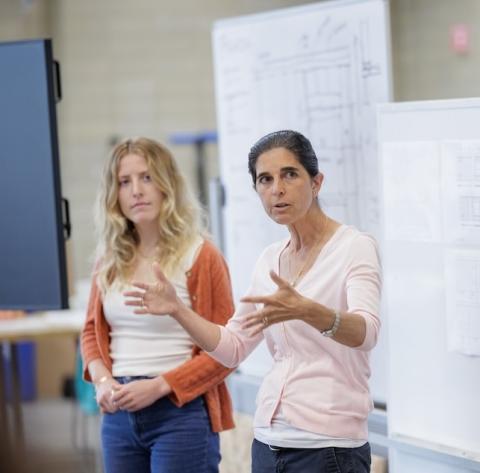 Karen Beck Pooley leads a discussion for the Alley House Program