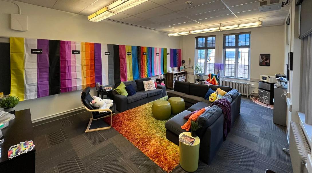 Inside of the Lehigh Pride center with LGBTQ flags on the wall