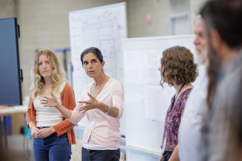 Karen Beck Pooley leads a discussion for the Alley House Project