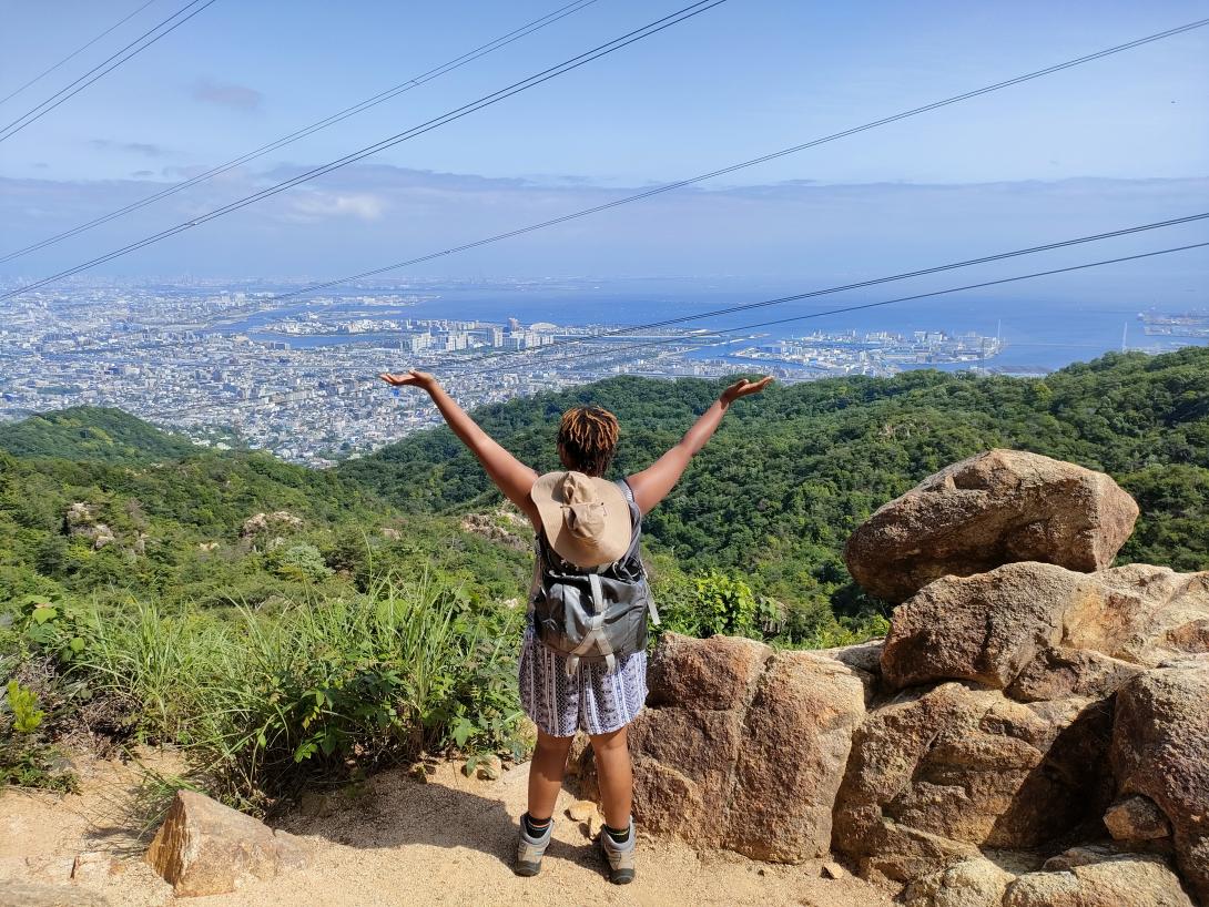 Zena Meighan hikes a mountain in Japan