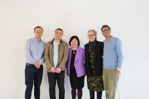 Author Ken Liu stands with Lehigh faculty for a photo